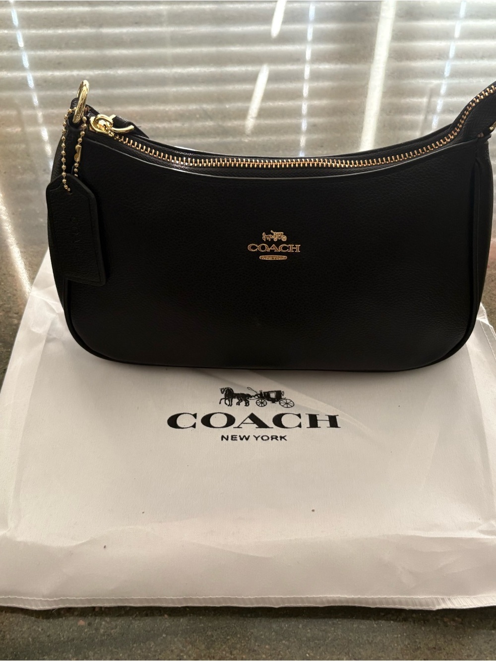 Black Leather Shoulder Bag with Gold Hardware